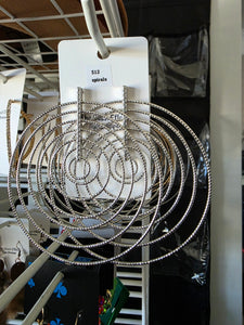 large silver spirals